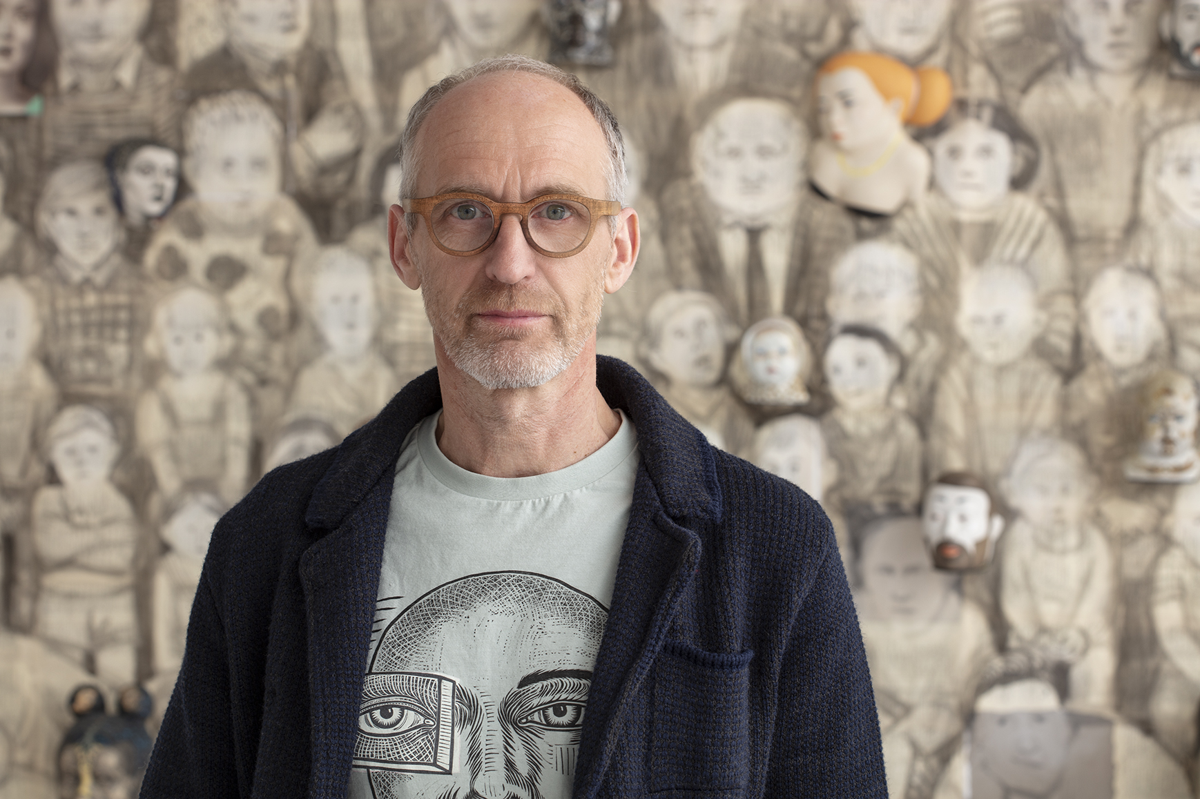 Sergei Isupov, Artist Portrait in front of "Past & Present" Installation, 2022. Photo by John Polak Photography.
